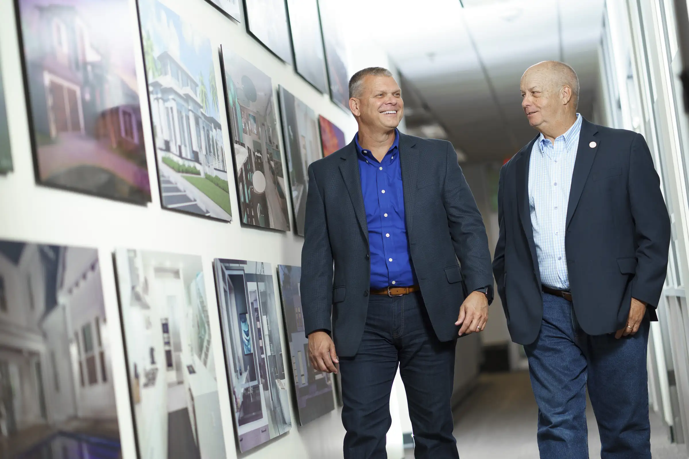 TSG's founders walking through the office